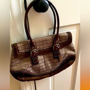 Authentic vintage classic coach handbag with suede bottom.